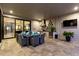 Covered outdoor kitchen and dining area at 1039 Jack Nicklaus Ct, Kissimmee, FL 34747