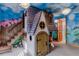 Enchanted playhouse and bedroom with mural at 1039 Jack Nicklaus Ct, Kissimmee, FL 34747