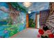 bedroom with magical mural and playhouse at 1039 Jack Nicklaus Ct, Kissimmee, FL 34747
