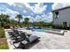 Enjoy the sun on comfortable lounge chairs by the pool at 1039 Jack Nicklaus Ct, Kissimmee, FL 34747