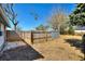 A view of the fenced in backyard and patio area at 105 N Ortman Dr, Orlando, FL 32805