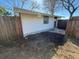 View of home's backyard area showing wooden fence at 105 N Ortman Dr, Orlando, FL 32805