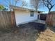 View of home's backyard area showing wooden fence at 105 N Ortman Dr, Orlando, FL 32805