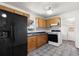 Modern kitchen features stainless steel appliances and neutral finishes at 105 N Ortman Dr, Orlando, FL 32805