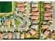 Aerial view of a residential neighborhood showing homes and streets at 10680 Royal Cypress Way, Orlando, FL 32836