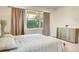 Comfortable bedroom with a king-size bed and ample closet space at 10680 Royal Cypress Way, Orlando, FL 32836