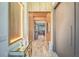 Bright entryway with wood wall accents and modern decor at 10680 Royal Cypress Way, Orlando, FL 32836