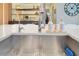Modern kitchen sink with a sleek stainless steel finish at 10680 Royal Cypress Way, Orlando, FL 32836