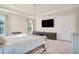 Bright main bedroom with a king-size bed and large windows at 10680 Royal Cypress Way, Orlando, FL 32836