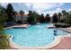 Community pool with plenty of space for swimming and relaxing at 1128 S Beach Cir, Kissimmee, FL 34746