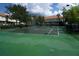 Well-maintained tennis court for residents' recreation at 1128 S Beach Cir, Kissimmee, FL 34746