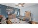 Charming bedroom with a double bed and themed decor at 11412 Chateaubriand Ave, Orlando, FL 32836