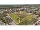Arial view of a community park with walking paths and a central fountain at 11412 Chateaubriand Ave, Orlando, FL 32836