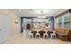 Bright dining area with built in bench seating and large table at 11412 Chateaubriand Ave, Orlando, FL 32836