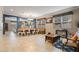 Open concept dining area with a large table and seating area at 11412 Chateaubriand Ave, Orlando, FL 32836