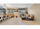 Spacious dining area with a large wooden table and seating at 11412 Chateaubriand Ave, Orlando, FL 32836
