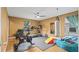 Home gym with treadmill, exercise bike, and punching bag at 11412 Chateaubriand Ave, Orlando, FL 32836