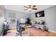 Home office with wood flooring, dual monitors, and comfortable office chair at 11412 Chateaubriand Ave, Orlando, FL 32836