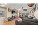 Living Room with sectional sofa and large screen TV at 11412 Chateaubriand Ave, Orlando, FL 32836