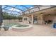 Covered patio with pool, spa, and seating at 11412 Chateaubriand Ave, Orlando, FL 32836