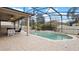 Enjoy this large pool and spa with patio at 11412 Chateaubriand Ave, Orlando, FL 32836