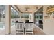 Covered patio furniture with pool view at 11412 Chateaubriand Ave, Orlando, FL 32836