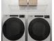Laundry room with side-by-side Whirlpool washer and dryer at 1273 Coral Bean Ln, Winter Springs, FL 32708