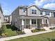 View of the home's exterior showcases its charming curb appeal and well-maintained front yard at 1309 Coral Bean Ln, Winter Springs, FL 32708