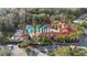 An aerial view of the community's pool, clubhouse, and surrounding amenities at 1375 Tuscana Ln # 1107, Davenport, FL 33896