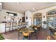 The clubhouse features an indoor bar and seating for residents and guests at 1375 Tuscana Ln # 1107, Davenport, FL 33896