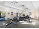 Onsite gym offers various exercise machines, weights, and open space for residents at 1375 Tuscana Ln # 1107, Davenport, FL 33896