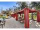 Lounge chairs line a row of shady cabanas by the community pool at 1375 Tuscana Ln # 1107, Davenport, FL 33896