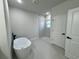 Bathroom with modern soaking tub, standalone shower, and tile flooring at 150 Marion Oakes Trl, Ocala, FL 34473