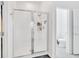 Modern bathroom with a large walk-in shower and toilet at 157 Pineywoods St, St Cloud, FL 34769