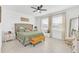 Spacious bedroom with king-size bed and neutral color palette at 157 Pineywoods St, St Cloud, FL 34769