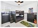 bedroom with bunk beds, dresser, and fun decor at 157 Pineywoods St, St Cloud, FL 34769