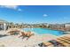 Inviting community pool with lounge chairs and a poolside patio at 157 Pineywoods St, St Cloud, FL 34769