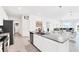 Modern kitchen with stainless steel appliances and large island at 157 Pineywoods St, St Cloud, FL 34769