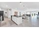 Modern kitchen with stainless steel appliances and a large island at 157 Pineywoods St, St Cloud, FL 34769