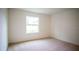 Spacious bedroom with neutral walls and carpeted floor at 1655 Andover Ridge Dr, Deland, FL 32720