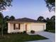 One story house with front yard and driveway at 1655 Andover Ridge Dr, Deland, FL 32720