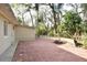 Spacious brick patio surrounded by lush landscaping at 176 E Grandbend Ave, Lake Mary, FL 32746