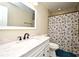 Bathroom with white vanity, seashell shower curtain at 176 E Grandbend Ave, Lake Mary, FL 32746