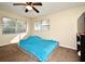 Bright bedroom with double closets and ceiling fan at 176 E Grand Bend Ave, Lake Mary, FL 32746