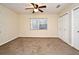 Bright bedroom with closet and ceiling fan at 176 E Grandbend Ave, Lake Mary, FL 32746