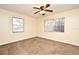 Well lit bedroom with neutral walls and ceiling fan at 176 E Grandbend Ave, Lake Mary, FL 32746