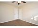Bedroom with ceiling fan, carpet, and double door closet at 176 E Grandbend Ave, Lake Mary, FL 32746