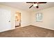 Bedroom with ensuite bathroom and ceiling fan at 176 E Grandbend Ave, Lake Mary, FL 32746
