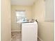 Laundry room with washer, dryer, and window at 176 E Grandbend Ave, Lake Mary, FL 32746