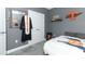 Bedroom with a decorative mirror and collegiate decor at 179 Hillcrest Dr, Oviedo, FL 32765